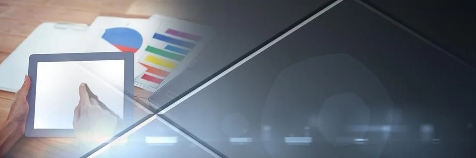 Hands touching tablet on table with charts and grey smart tech transition 스톡 사진
