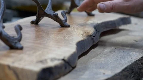 Hands touching wood craft , handmade coat hanger Stock Footage 124939092