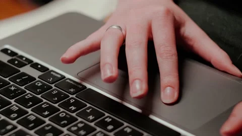 Hands on the touchpad Stock Footage 148045296