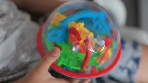 In the hands of a toy puzzle Stock Footage 130912765