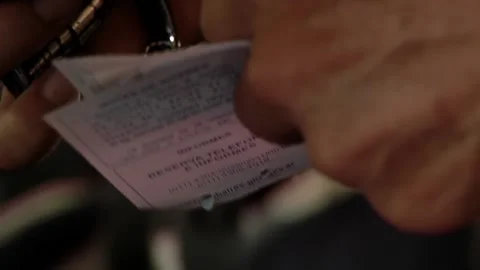 Hands of Train Inspector Punching Passenger Ticket, Old Railway Service  Stock Footage 154875943