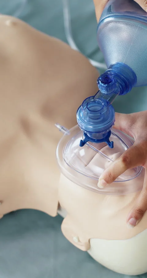 Hands, training and person with ventilator for oxygen or demonstration for Stock Footage 332969897