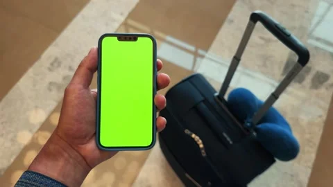 Hands of traveller using smartphone for connecting, using app. Tourist waiting Video stock 282365860