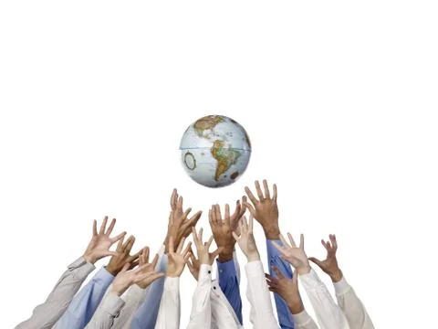 Hands trying to reach the globe Stock Photos