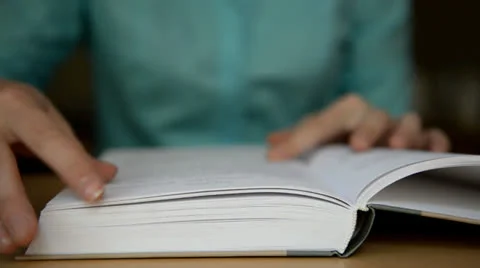 Hands turn pages of the book Video stock 24624108