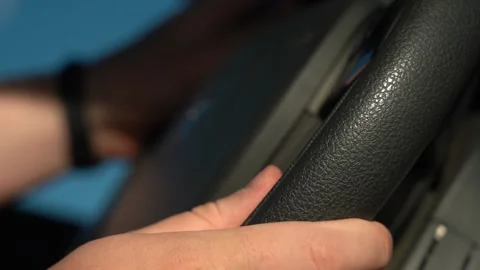 Hands turn the steering wheel. Stock Footage 167930709