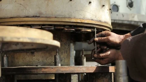 The hands turn the valve in the factory Video stock 87516979