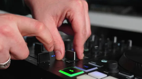 Hands turning knobs and pushing buttons on music mixing board at home recording 스톡 동영상 232659724