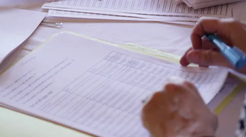 Hands Turning Paper Stock Footage 37495135