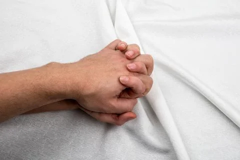 Hands of two lovers. Man and woman, passion and making love concept. White Stock Photos