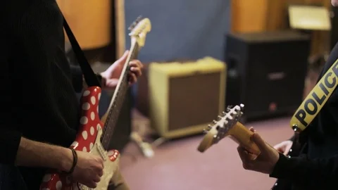 Hands of Two Men Playing Electric Guitars Stock Footage 72158316