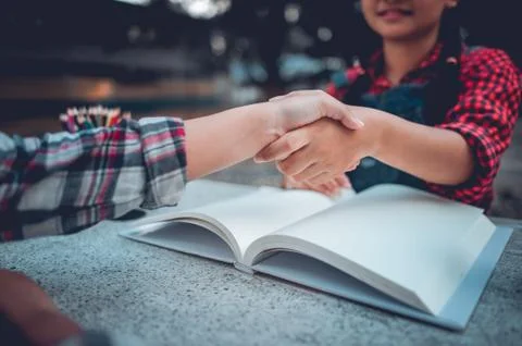 The hands of two people represent unity in work. Successful Business To be a  Stock Photos