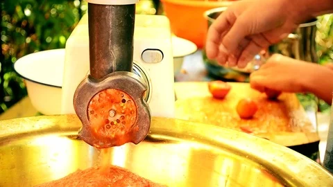 Hands of two persons cutting and chopping tomatos Stock Footage 73184334