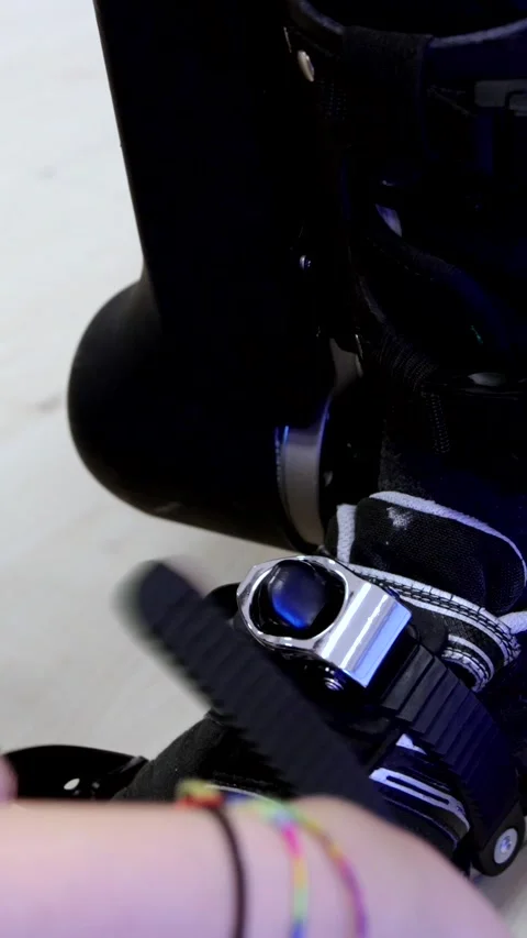 Hands tying exoskeleton to patient 스톡 동영상 256938526