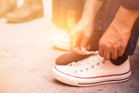 Hands tying a shoes. Stock Photos