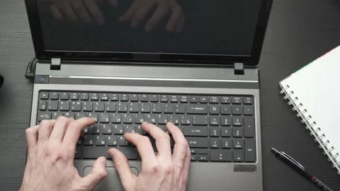 Hands type on laptop keyboard Stock Footage 150945870