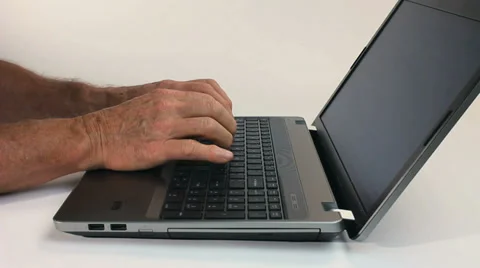 HANDS TYPEING ON LAPTOP AGAINST WHITE Stock Footage 35349883