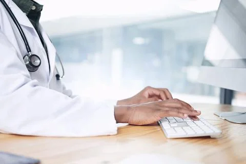 Hands, typing and doctor with computer in clinic for medical report, resear.. Stock Photos