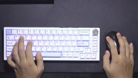 Hands typing and gaming PC computer keyboard. Man using wireless mechanical.. Stock Footage 308024294