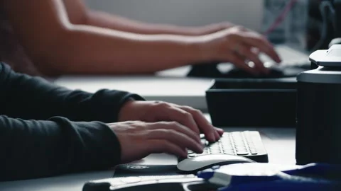 Hands Typing on Black Computer Keyboard in Office Stock Footage 328617409