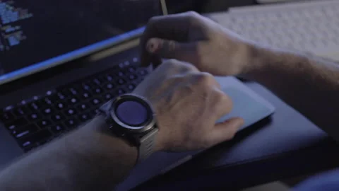 Hands Typing Code and Checking the Time Video stock 208746249