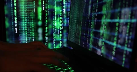 Hands typing code on a laptop keyboard, hacking or programming concept Stock Footage 300398064
