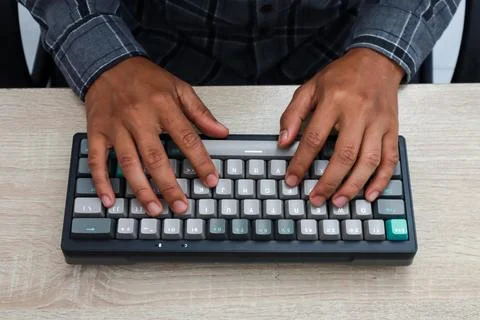 Hands Typing On A Compact Mechanical Keyboard Stock Photos