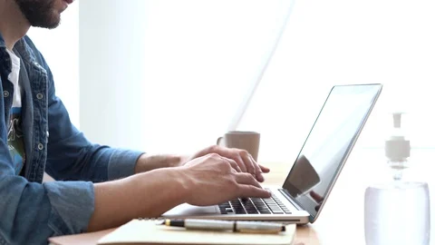 Hands typing on computer keyboard, business man working on laptop pc in office Stock Footage 129166731
