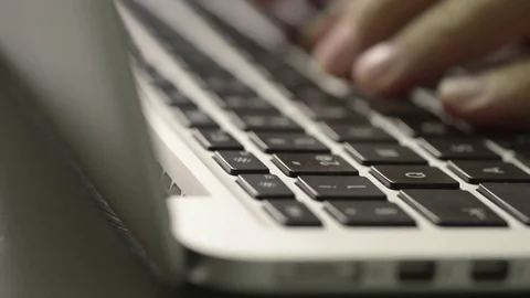 Hands typing on computer keyboard in close up. Stock Footage 70027862