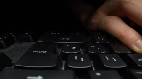 Hands typing on a computer keyboard. Dolly shot. left to right. Macro. Stock Footage 120611167