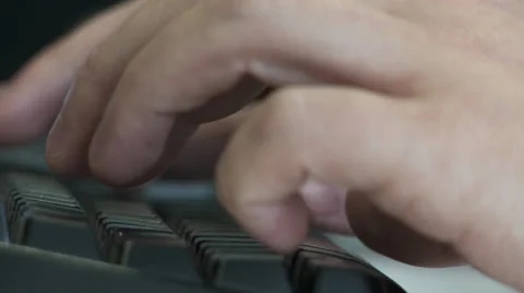 Hands typing on a computer keyboard Stock Footage 25228829