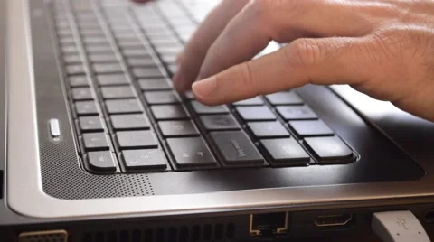 Hands typing on a computer keyboard Stock Footage 48019629