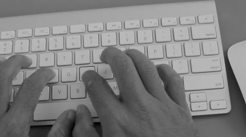 Hands typing on computer keyboard Stock Footage 49947303