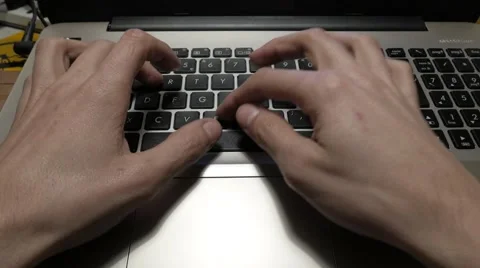Hands typing on a computer keyboard Stock Footage 59799118