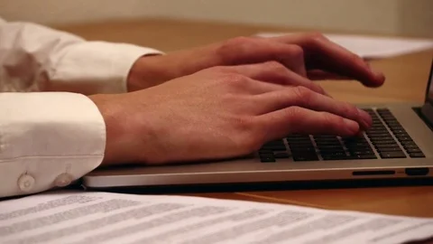 Hands typing on a computer keyboard Stock Footage 74177046