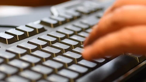 Hands typing on computer keyboard Stock Footage 101948100