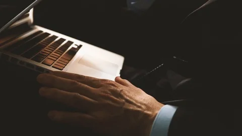 Hands typing on computer keyboard Stock Footage 124258940