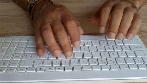 Hands typing on computer keyboard Stock Footage 205932216
