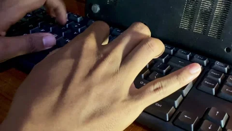 Hands Typing on Computer Keyboard Stock Footage 325357797