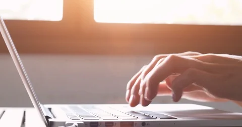 Hands typing on computer keyboard, moving camera Stock Footage 93643875