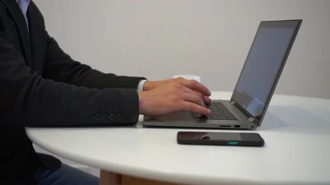 Hands typing on computer keyboard, moving camera, business man working on laptop Stock Footage 159502454