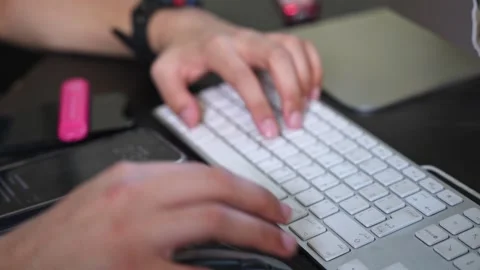 Hands Typing On Computer Keyboard Near Vape Stock Footage 334416105