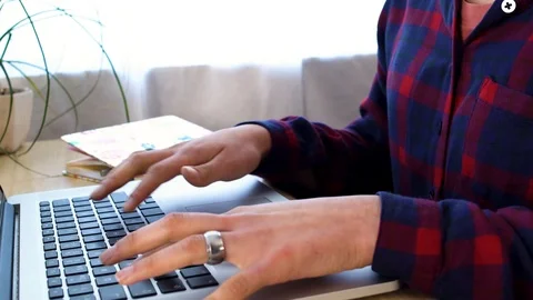 Hands typing on a computer keyboard, woman's hands with rings typing Stock Footage 126193173