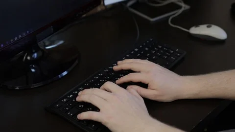 Hands typing on computer keyboard. Working on a computer. Office business. Stock Footage 121472992