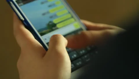 Hands typing fast text message on smartphone Stock Footage 11314875