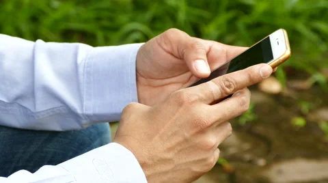 Hands typing fast text messages on smart phone Stock Footage 65803255