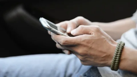 Hands typing fast text messages on smart phone Stock Footage 78520816