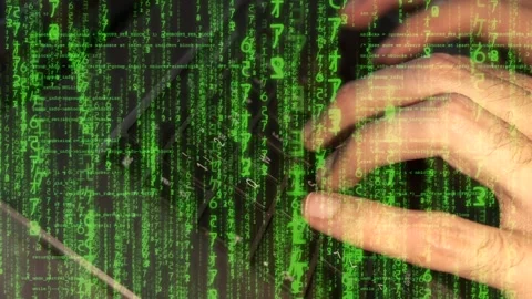 Hands typing with green Matrix-style code overlay. Cyber coding and hacker Stock Footage 285832413