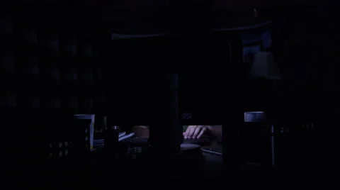 Hands typing on keyboard in dark room 스톡 동영상 67553393