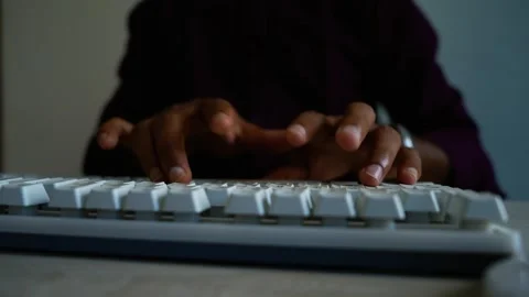 Hands Typing on Keyboard in Dark Room, Close-up of hands typing on a comput.. Video stock 346460003